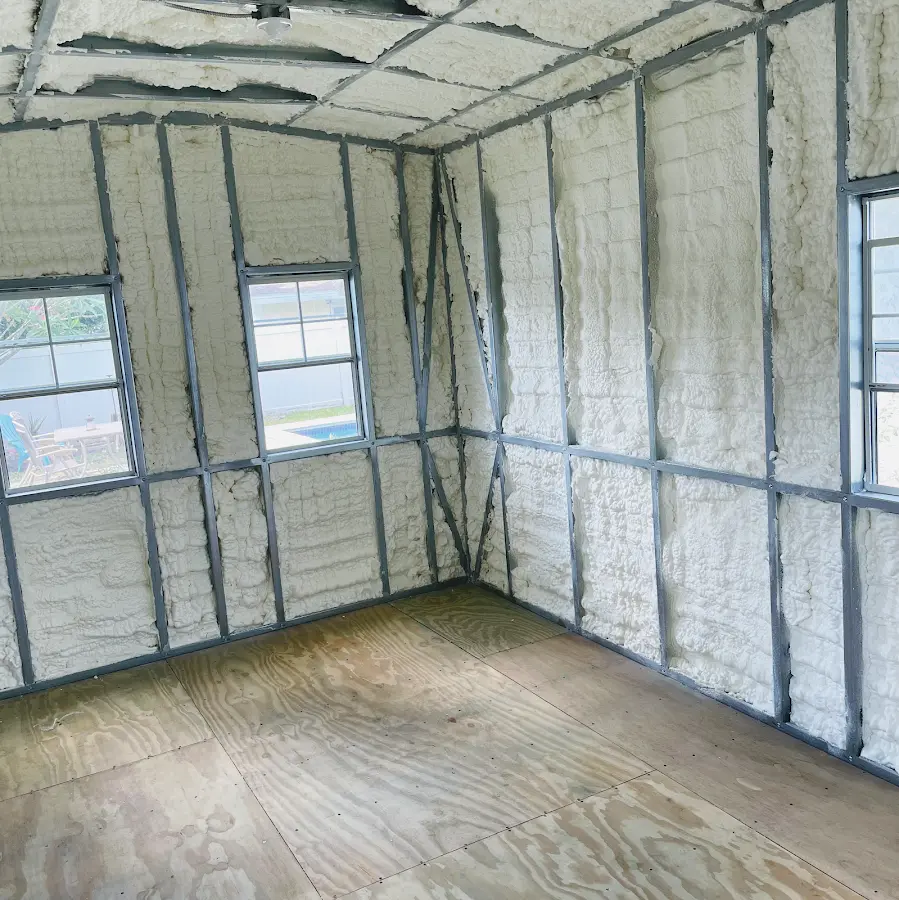 Closed-cell spray foam insulation applied to wall cavities in a residential project in Montclair